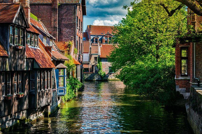 Bruges Guided or Audio Trip with Canal Cruise Option from Paris - UNESCO Medieval Core: Béguinage, Holy Blood Basilica, City Hall, and Notre-Dame Views