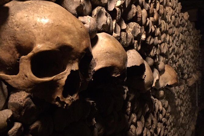 Catacombs of Paris Semi-Private VIP Restricted Access Tour - The walk down: steps, cold tunnels, and slippery floors