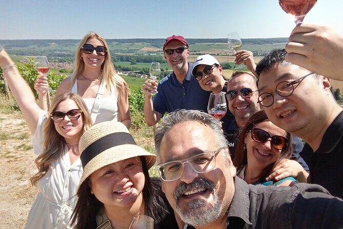 Champagne Day Trip from Paris with 8 Tastings & Lunch - Vineyard drive between Reims, Ay, and Épernay