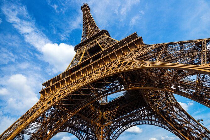 Eiffel Tower Elevator Tour with Optional Summit & Cruise Access - How the Guide Changes the Entire Experience