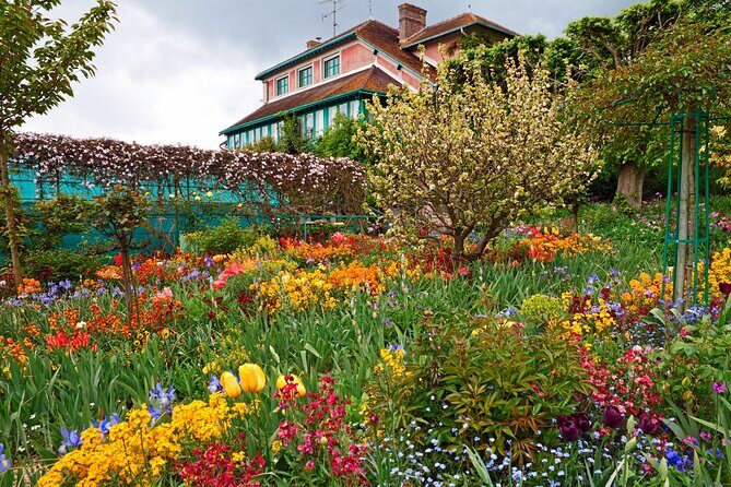 Giverny Monet’s Home and Gardens Half Day Tour from Paris - Giverny village time: shops, cafés, and the tombstone