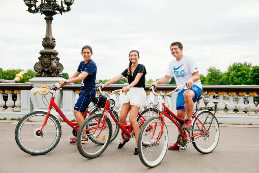 Highlights of Paris Bike Tour in English or Dutch - Your Guide Matters: Stories, Humor, and Safety on Two Wheels