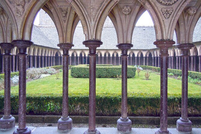 Mont Saint Michel Day Trip from Paris with English Speaking Guide - Shuttle and walking logistics: parking, waits, and that 40-minute stretch