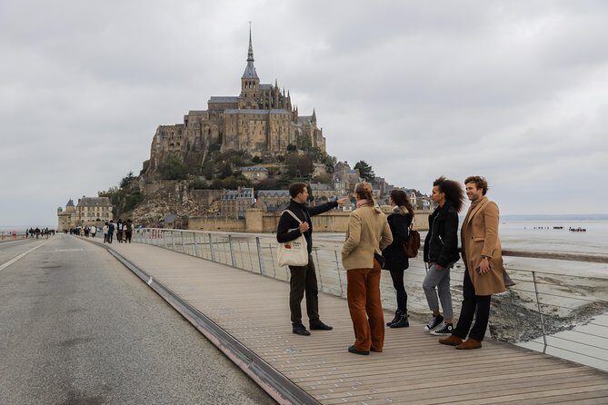Mont Saint Michel Guided Day Trip with Abbey Entry from Paris - Fortifications du Mont-Saint-Michel: pilgrims’ paths and Atlantic views