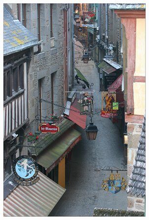 Mont Saint Michel Guided Day Trip with Abbey Entry from Paris - Abbaye du Mont-Saint-Michel: layered Gothic over centuries