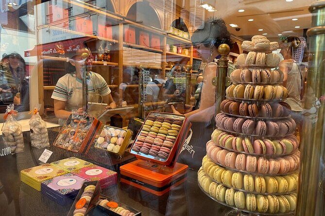Montmartre Hill French Gourmet Food and Wine Tasting Walking Tour - The art landmarks you pass: Moulin Rouge, Picasso, and love in many languages