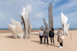 Normandy D-Day Beaches and American Cemetery Day Trip from Paris - Stop 1: Pointe du Hoc’s Craters and Rangers’ Climb