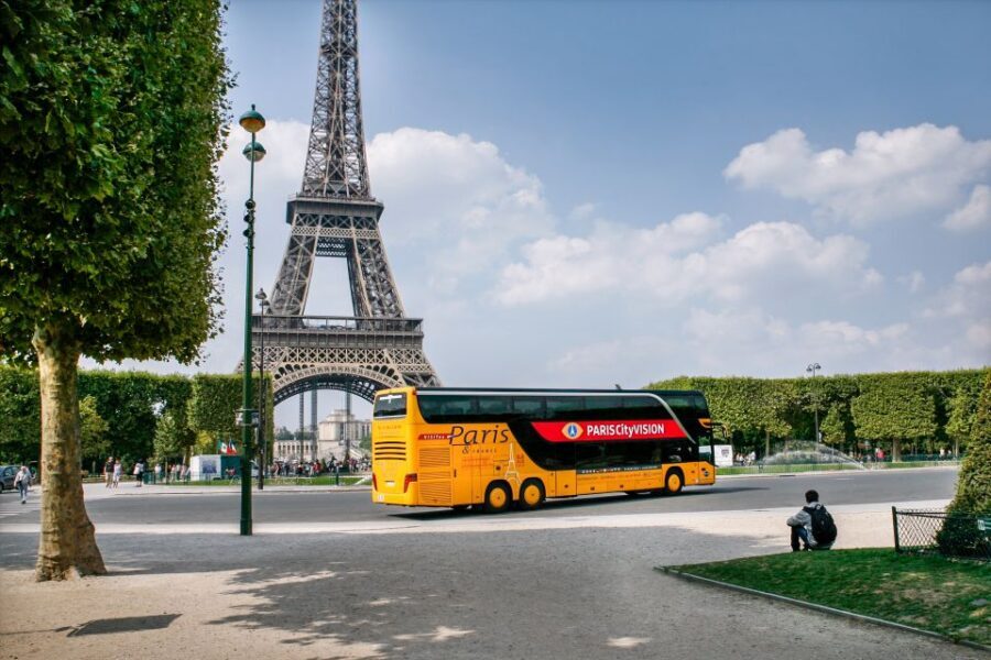 Paris: Audio-Guided Bus Tour & Seine River Cruise - Coach tour: the 1.5-hour Paris loop with tablet visuals and a live host