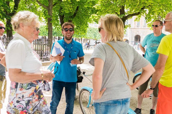 Paris Bike Tour Hidden Secrets in the Latin Quarter & Le Marais neighborhoods - Place des Vosges and Philip II’s wall: beauty plus fortification