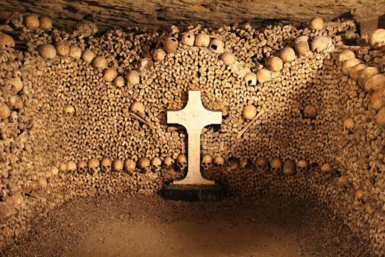 Paris: Catacombs Entry & Seine River Cruise with Audio Guide - Entering the catacombs: steps, temperature, and the audio guide setup