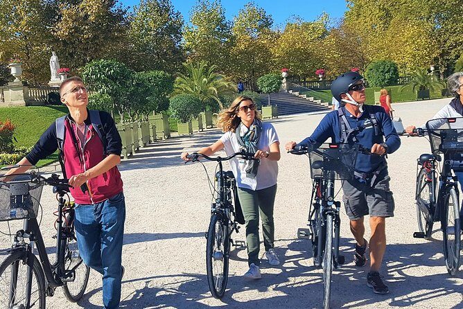 Paris: Charming Nooks and Crannies Bike Tour - Bastille square and the Seine-side rhythm: prison myths, Bastille Day, and a drink stop