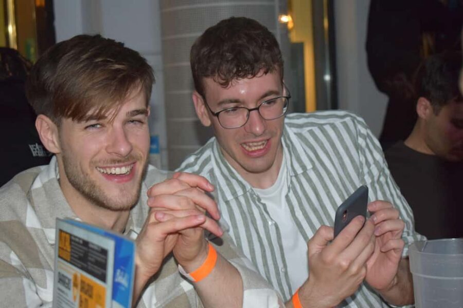 Paris: City Center Guided Pub Crawl with Shots & Club Entry - Bar-to-bar hopping: discounts, games, and staying on tempo