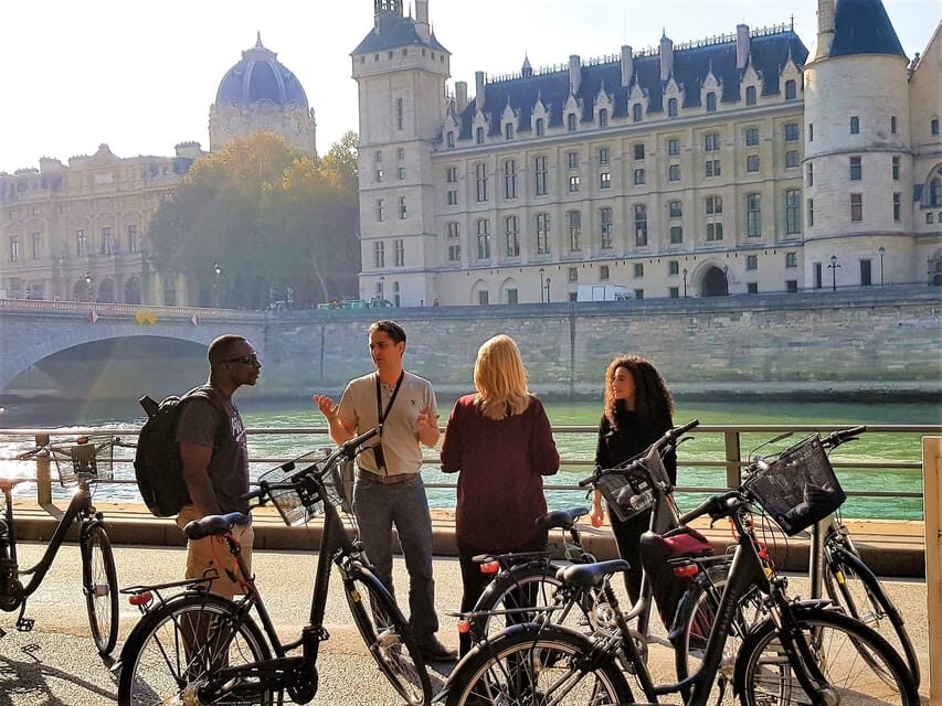Paris: City Treasures Bike Tour - Starting at Hôtel de Ville: find the guide, then go