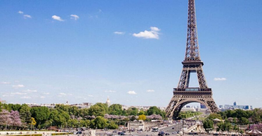 Paris: Eiffel Tower Summit Floor Ticket & Seine River Cruise - Meeting at Le Champ de Mars Cafe, then letting the tower logistics fade