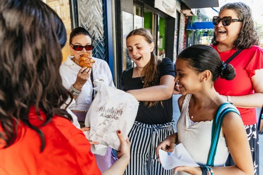 Paris: Hidden Gems of Montmartre with Local Guide - From Moulin Rouge windmill to the quieter art streets