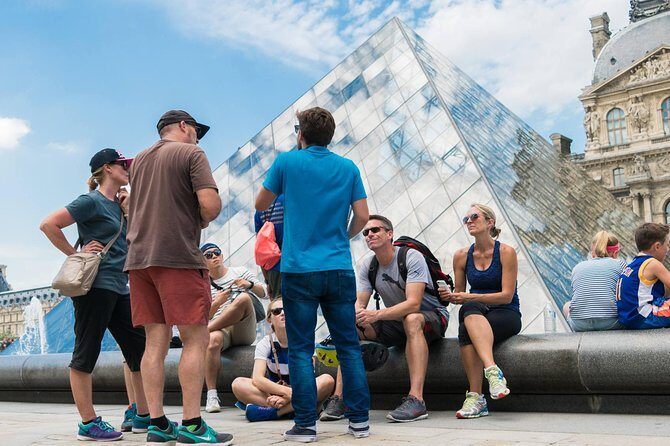 Paris Highlights Bike Tour: Eiffel Tower, Louvre and Notre-Dame - Seine River, Place de la Concorde, and the Champs-Élysées Run