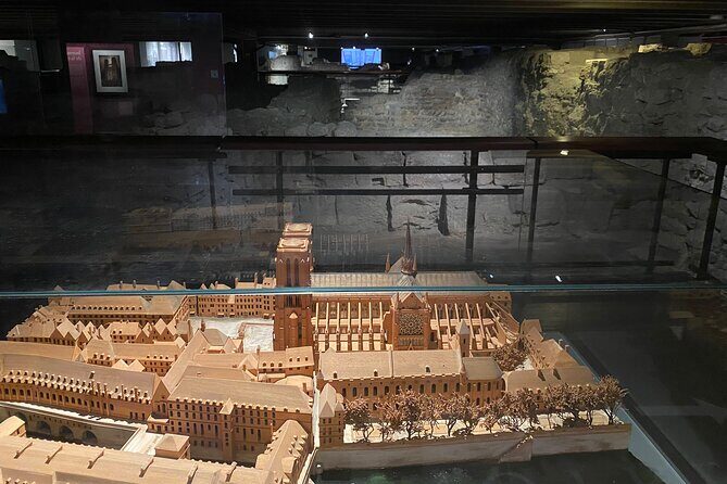 Paris: Île de la Cité and Notre-Dame Walking Tour With Crypt - Place Dauphine: a small square with big architectural confidence