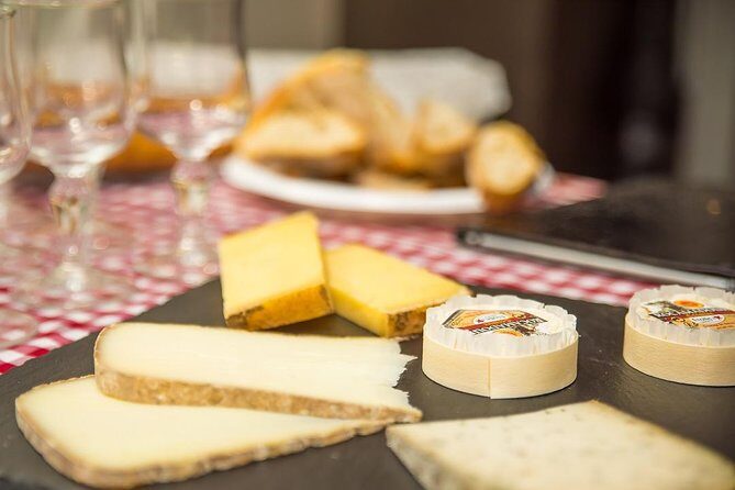 Paris Le Marais District Original Food and Wine Tasting Tour - The landmarks you pass: Hôtel de Ville, Saint-Paul Saint-Louis, and Place des Vosges