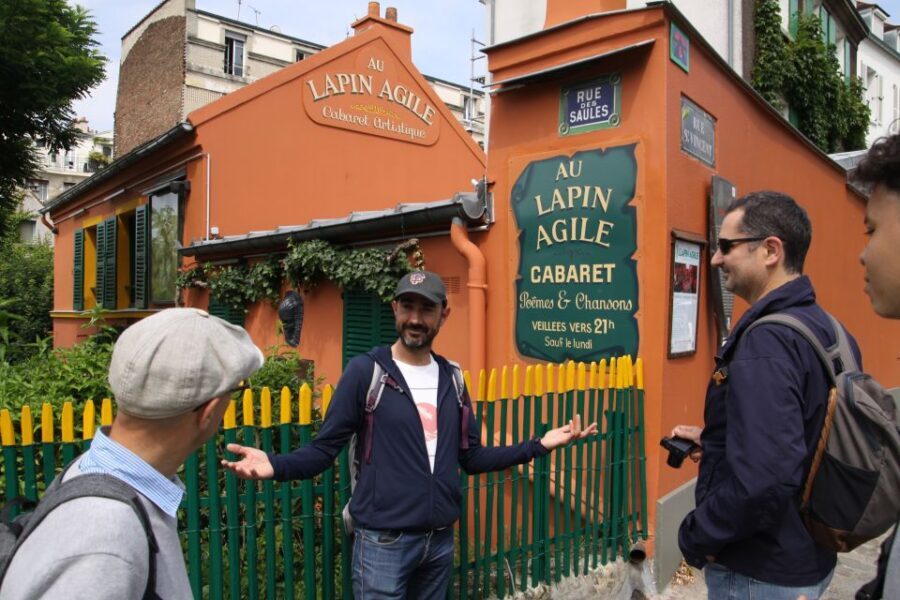 Paris: Montmartre Culture and Local Pastries Walking Tour - Place du Tertre: seeing the art square as a living part of Montmartre
