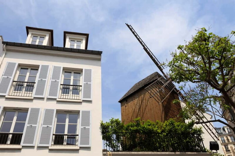 Paris: Montmartre Hidden Gems and Highlights Walking Tour - Place du Tertre and the Reality of Paris Artists