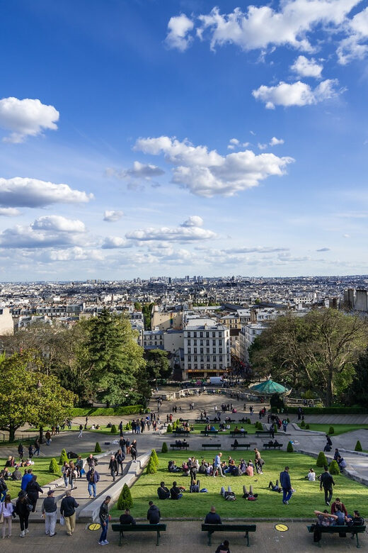 Paris: Montmartre Highlights Walking Tour with a Local Guide - Moulin de la Galette to Maison Rose: Photos, Windmill Nostalgia, and a Real Break