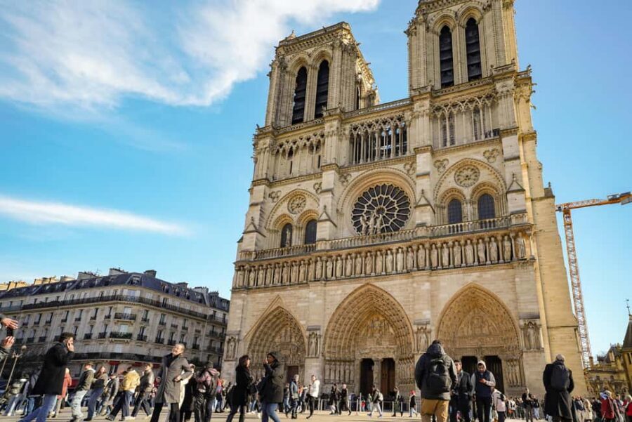 Paris: Notre Dame Cathedral Exterior Tour with Free Entry - What you see outside: flying buttresses, gargoyles, and the West Façade