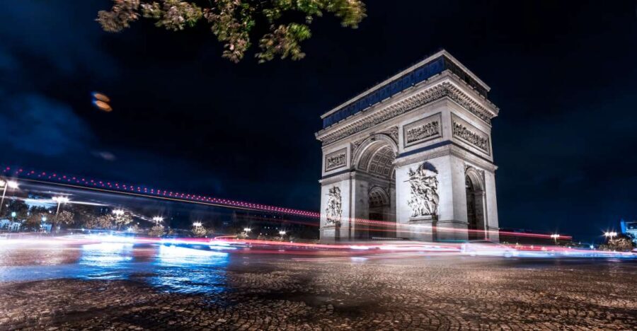 Paris: Panoramic Night Tour with Audio Guide and Host - Paris Illuminations From an Open-Top Coach: What the 90 Minutes Feels Like