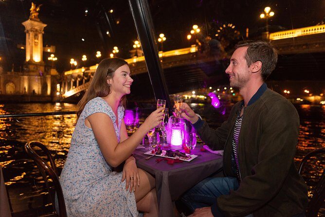 Paris Seine River Dinner Cruise with Champagne and Window Seating - Why this Seine dinner feels different at night