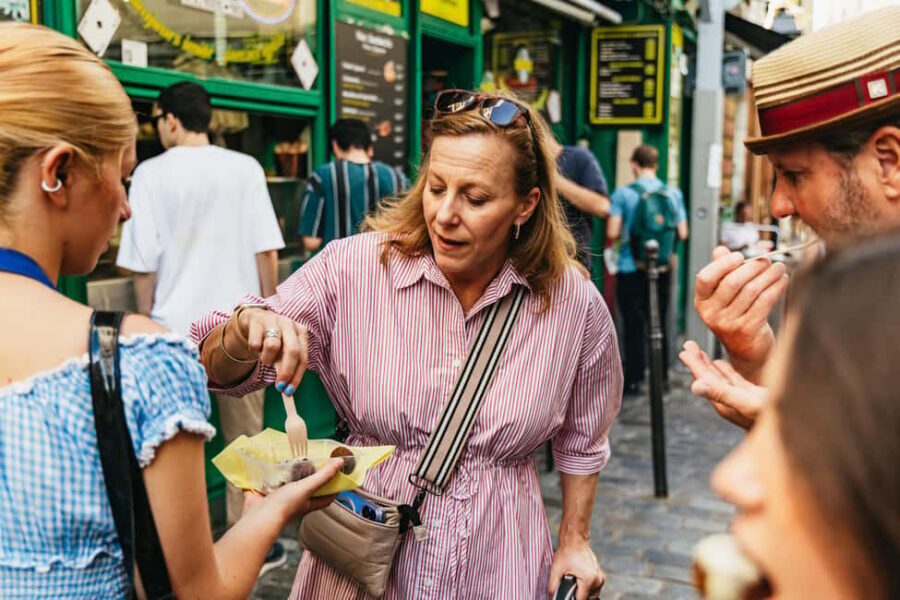 Paris: Walking Food Tour with Cheese, Wine and Delicacies - Charcuterie, Hams, and Pastries: Building a French Meal One Stop at a Time