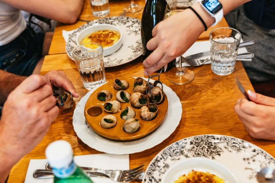 Paris: Walking Food Tour with Cheese, Wine and Delicacies - The One Restaurant Stop: Where You Sit Down and Eat More