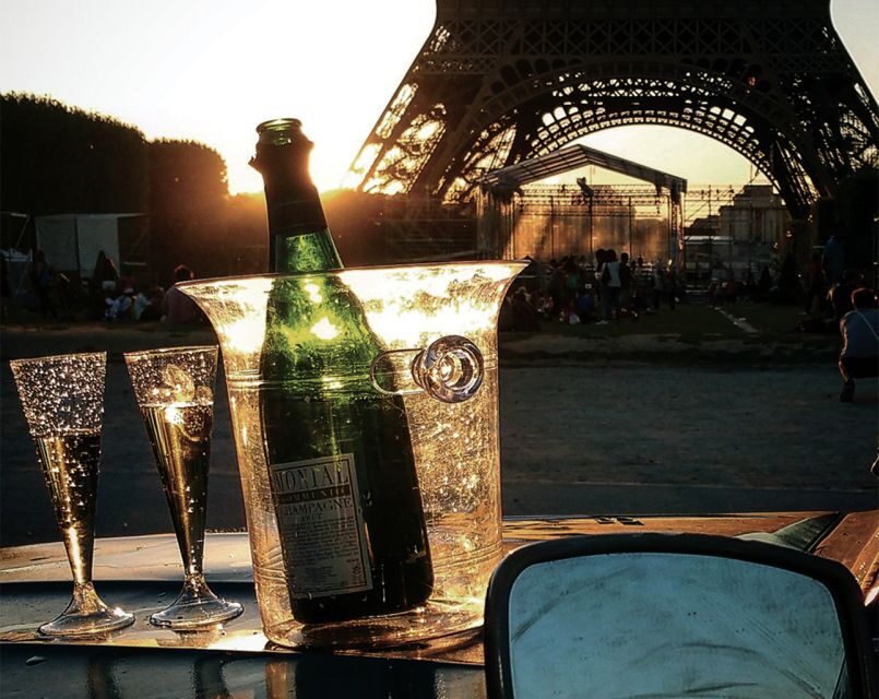 Private tour of Paris by Night with Champagne - Passing the Louvre, Notre-Dame, and Opéra Garnier