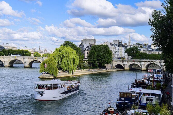 Seine River Guided Cruise by Vedettes de Paris - Arab World Institute, Île Saint-Louis, and the residential Paris vibe