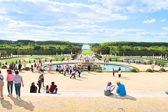 Versailles Palace & Gardens Tour with Transport from Paris - Getting there: the coach ride, pickup point, and comfort details